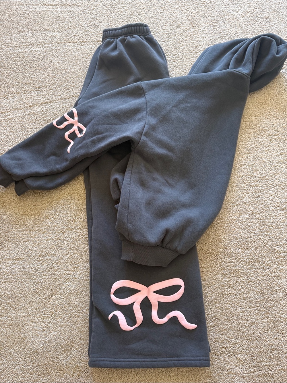 Edikted Charcoal Gray Sweatpants with Pink Bow Accent